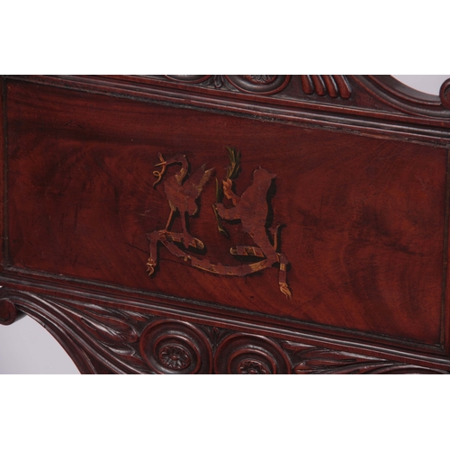 1280 - A PAIR OF REGENCY MAHOGANY HALL CHAIRS with scrolled carved backs and painted coats of arms to the p... 