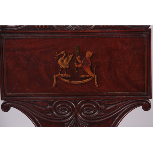 1280 - A PAIR OF REGENCY MAHOGANY HALL CHAIRS with scrolled carved backs and painted coats of arms to the p... 