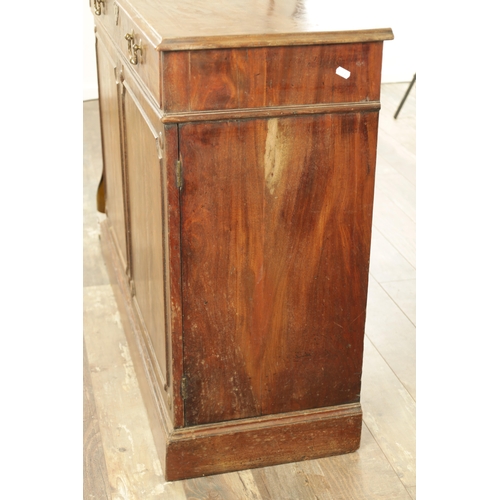 1285 - A GEORGE III MAHOGANY SIDE CABINET with top frieze drawer fitted with rococo style brass swan-neck h... 