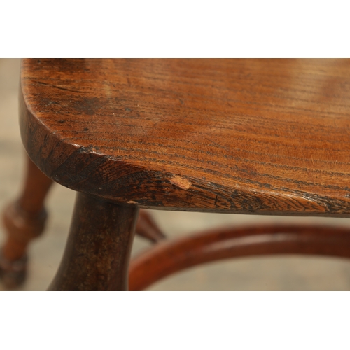 1290 - AN EARLY 19TH CENTURY NOTTINGHAMSHIRE YEW WOOD HIGH BACK WINDSOR CHAIR with hooped back and shaped p... 