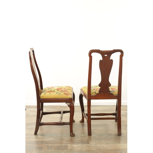 1296 - A PAIR OF EARLY 18TH CENTURY WALNUT SIDE CHAIRS the shaped frames and solid vase-shaped splats above... 