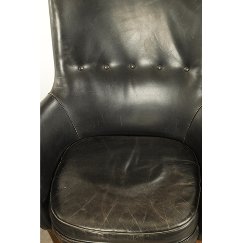 1299 - A PAIR VINTAGE 1970'S SWEDISH BLACK LEATHER ARMCHAIRS BY ARNE NORELL with label underneath Mobel AB ... 