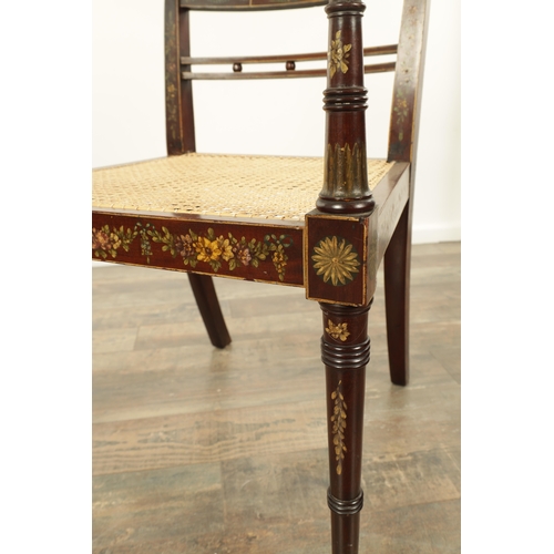 1303 - A GEORGE III PAINTED MAHOGANY BERGERE OPEN ARMCHAIR decorated with floral sprays bearing the portrai... 