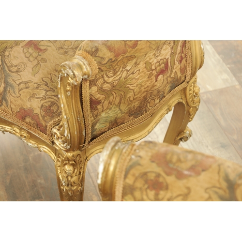 1305 - A SUITE OF FOUR CARVED GILTWOOD ROCOCO STYLE STOOLS comprising two window seats and two square stool... 