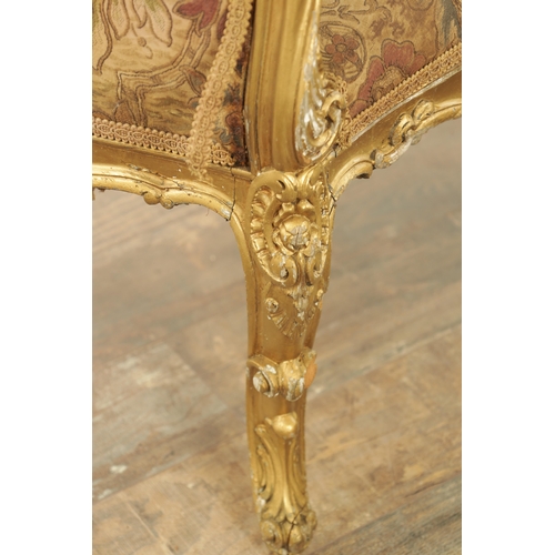 1305 - A SUITE OF FOUR CARVED GILTWOOD ROCOCO STYLE STOOLS comprising two window seats and two square stool... 