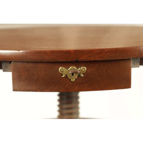 1309 - A RARE GEORGE II FIGURED MAHOGANY TWO-TIER REVOLVING TABLE the top with four frieze drawers above an... 