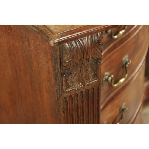 1312 - A GEORGE III MAHOGANY SERPENTINE CHEST OF DRAWERS with leaf-carved stop fluted corners enclosing a b... 