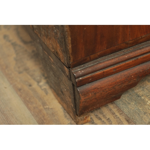 1312 - A GEORGE III MAHOGANY SERPENTINE CHEST OF DRAWERS with leaf-carved stop fluted corners enclosing a b... 