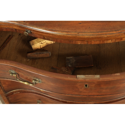 1312 - A GEORGE III MAHOGANY SERPENTINE CHEST OF DRAWERS with leaf-carved stop fluted corners enclosing a b... 