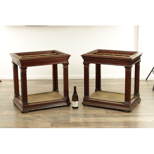 1320 - A GOOD PAIR OF 19TH CENTURY COUNTRY HOUSE WALNUT AND BRASS STICK STANDS having initials to the top r... 