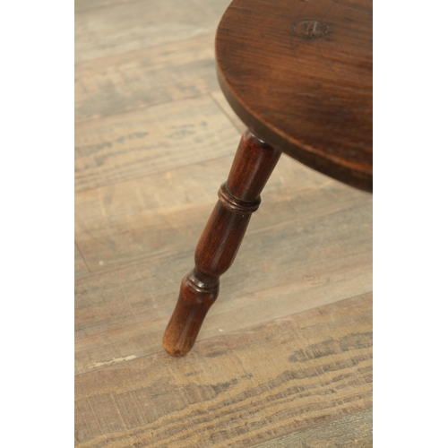 1321 - AN UNUSUAL 18TH-CENTURY ELM AND FRUITWOOD CRICKET TABLE with revolving top above a turned stem and u... 