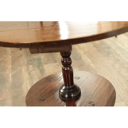 1321 - AN UNUSUAL 18TH-CENTURY ELM AND FRUITWOOD CRICKET TABLE with revolving top above a turned stem and u... 