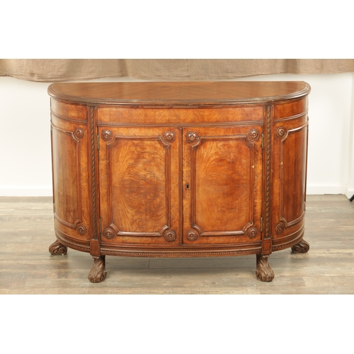 1322 - A 19TH CENTURY BOW FRONTED FIGURED ROSEWOOD SIDE CABINET with panelled front having two centre hinge... 