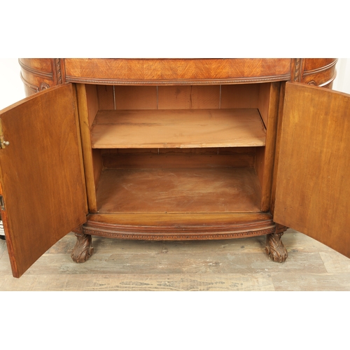 1322 - A 19TH CENTURY BOW FRONTED FIGURED ROSEWOOD SIDE CABINET with panelled front having two centre hinge... 