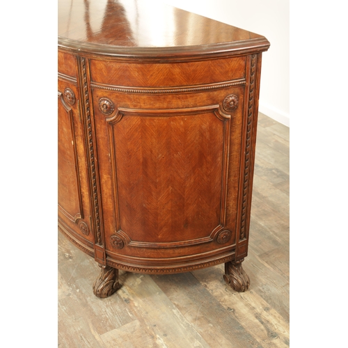 1322 - A 19TH CENTURY BOW FRONTED FIGURED ROSEWOOD SIDE CABINET with panelled front having two centre hinge... 