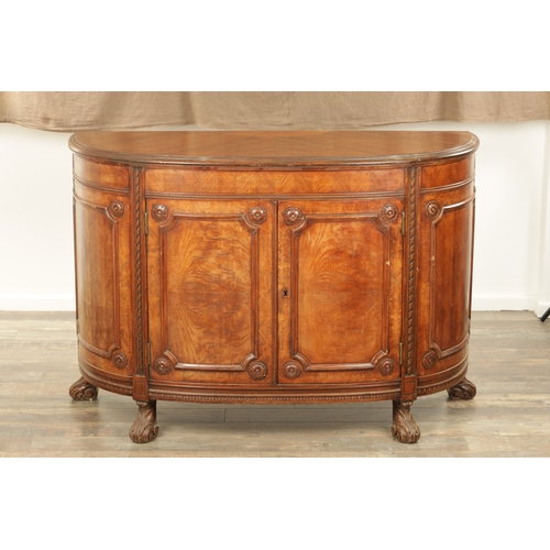 1322 - A 19TH CENTURY BOW FRONTED FIGURED ROSEWOOD SIDE CABINET with panelled front having two centre hinge... 