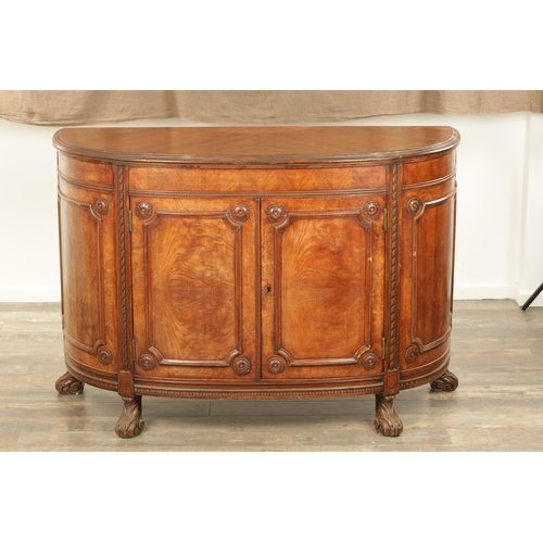 1322 - A 19TH CENTURY BOW FRONTED FIGURED ROSEWOOD SIDE CABINET with panelled front having two centre hinge... 