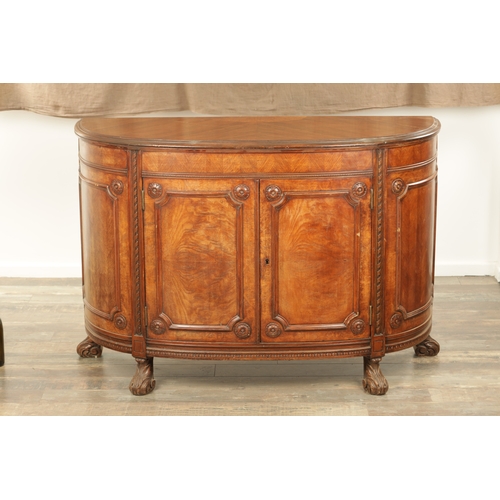 1322 - A 19TH CENTURY BOW FRONTED FIGURED ROSEWOOD SIDE CABINET with panelled front having two centre hinge... 