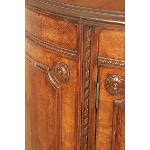 1322 - A 19TH CENTURY BOW FRONTED FIGURED ROSEWOOD SIDE CABINET with panelled front having two centre hinge... 