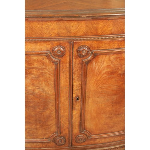 1322 - A 19TH CENTURY BOW FRONTED FIGURED ROSEWOOD SIDE CABINET with panelled front having two centre hinge... 