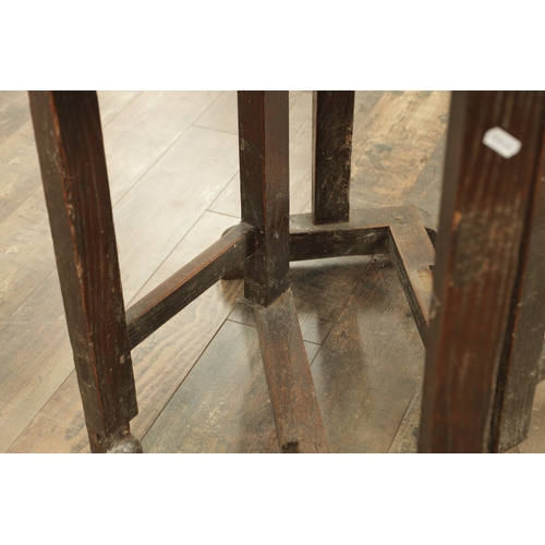 1324 - A 17TH CENTURY WALNUT GATE LEG TABLE OF SMALL SIZE with drop-down sides and joined base with hinged ... 