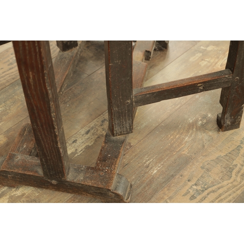 1324 - A 17TH CENTURY WALNUT GATE LEG TABLE OF SMALL SIZE with drop-down sides and joined base with hinged ... 