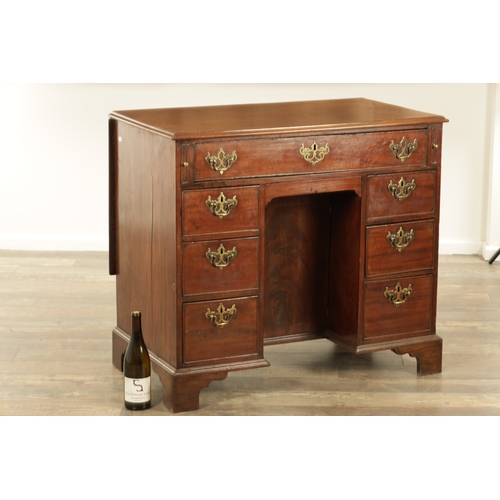 1325 - AN UNUSUAL GEORGE III MAHOGANY KNEEHOLE DESK having a drop-down top with graduated drawers fitted wi... 