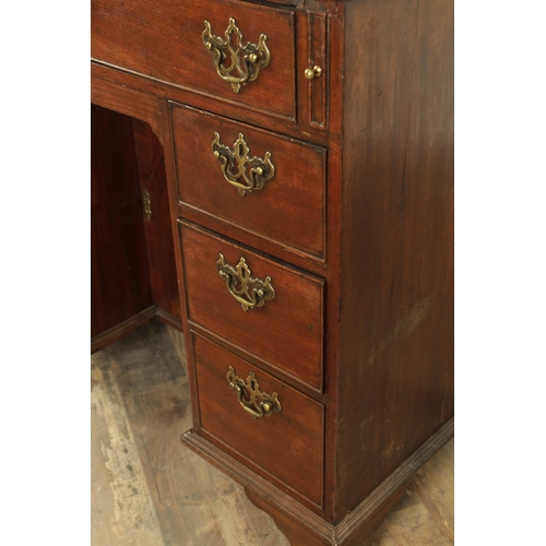 1325 - AN UNUSUAL GEORGE III MAHOGANY KNEEHOLE DESK having a drop-down top with graduated drawers fitted wi... 