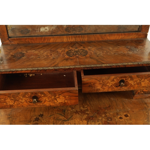 1327 - A 19TH CENTURY MARQUETRY AND FIGURED WALNUT BONIER DE JEUR having a mirrored back super-structure wi... 