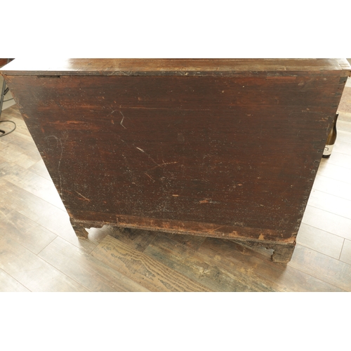 1330 - A GEORGE III INLAID MAHOGANY COMMODE with satinwood oval panels to the top and hinged doors raised o... 