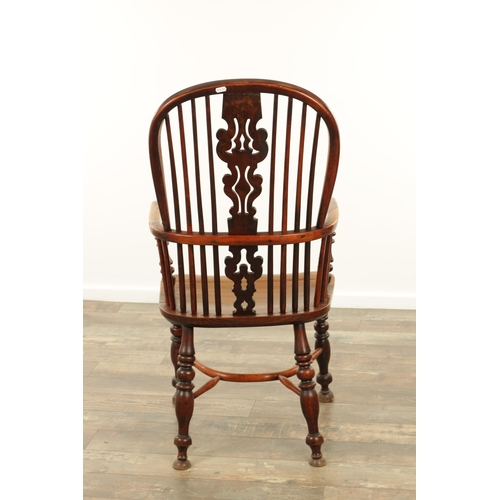 1331 - AN EARLY 19TH CENTURY NOTTINGHAMSHIRE YEW WOOD HIGH BACK WINDSOR CHAIR with hooped back and shaped p... 