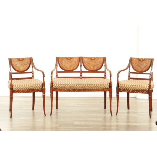 1332 - A 20TH CENTURY THREE PIECE SHERATON STYLE PAINTED MAHOGANY BERGERE SUITE with two chairs and a two-s... 