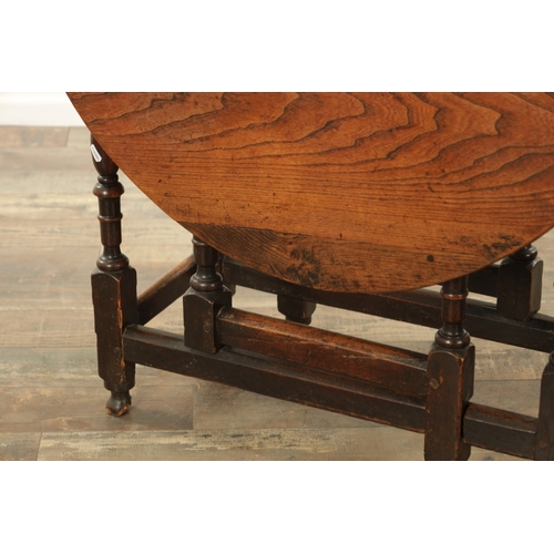 1334 - AN EARLY 18TH CENTURY JOINED ELM AND OAK GATELEG TABLE the richly figured oval drop leaf top above a... 