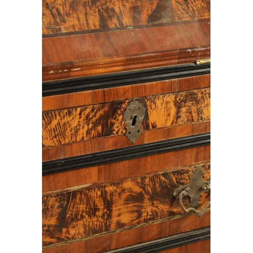 1335 - AN EARLY 18TH CENTURY CONTINENTAL MULBERRY WOOD BUREAU BOOKCASE with a shaped top surmount and hinge... 