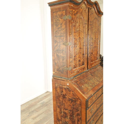 1335 - AN EARLY 18TH CENTURY CONTINENTAL MULBERRY WOOD BUREAU BOOKCASE with a shaped top surmount and hinge... 