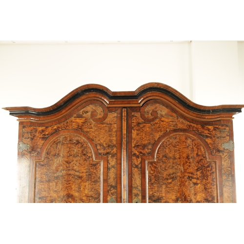 1335 - AN EARLY 18TH CENTURY CONTINENTAL MULBERRY WOOD BUREAU BOOKCASE with a shaped top surmount and hinge... 