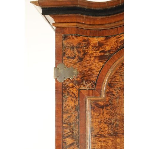 1335 - AN EARLY 18TH CENTURY CONTINENTAL MULBERRY WOOD BUREAU BOOKCASE with a shaped top surmount and hinge... 