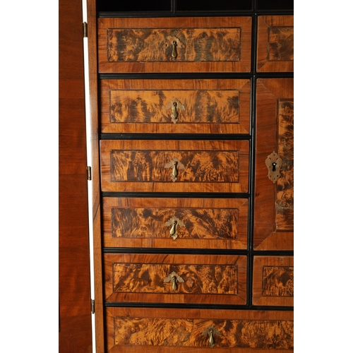 1335 - AN EARLY 18TH CENTURY CONTINENTAL MULBERRY WOOD BUREAU BOOKCASE with a shaped top surmount and hinge... 