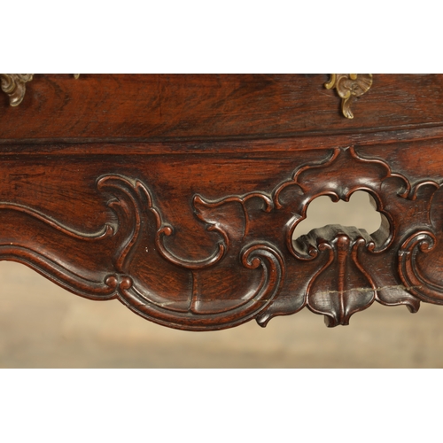 1339 - AN 18TH CENTURY ROSEWOOD ANGLO PORTUGUESE SERPENTINE SHAPED SIDE TABLE with moulded edge top above a... 