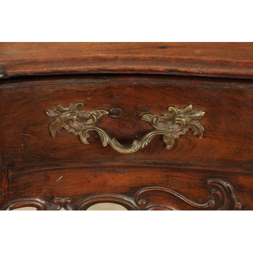 1339 - AN 18TH CENTURY ROSEWOOD ANGLO PORTUGUESE SERPENTINE SHAPED SIDE TABLE with moulded edge top above a... 