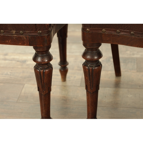 1340 - A SET OF FOUR ROSEWOOD WILLIAM IV DINING CHAIRS with open leaf carved backs and upholstered seats; r... 