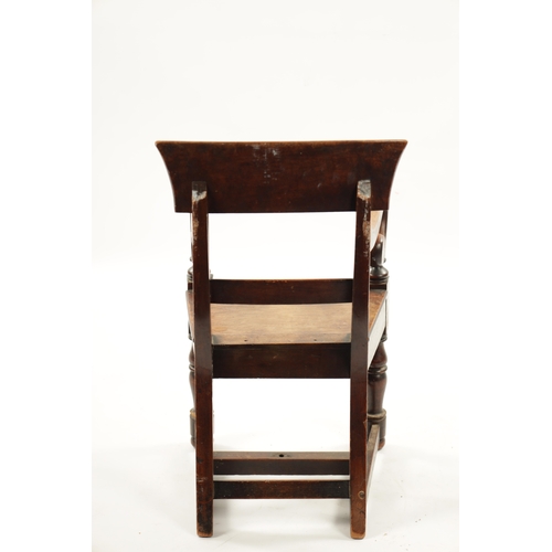 1342 - A 19TH CENTURY MAHOGANY CHILDS CHAIR with bar back and scrolled arms raised on turned legs (62cm hig... 