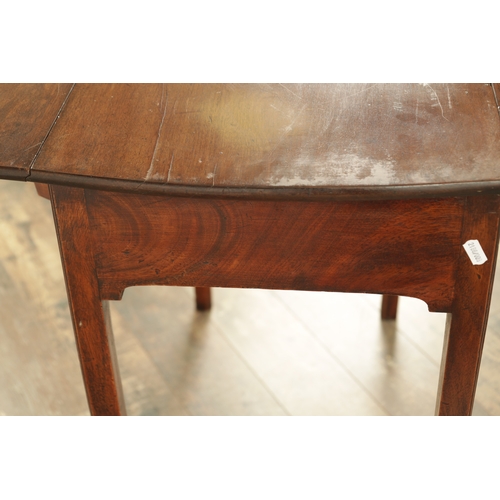 1343 - A GOOD GEORGE II MAHOGANY SERPENTINE SHAPED PEMBROKE TABLE with hinged fall down sides and frieze dr... 