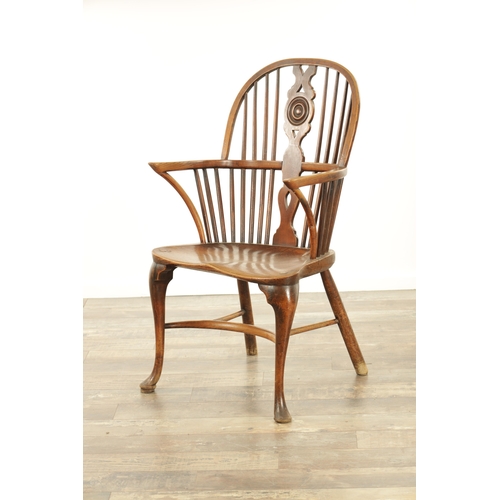 1347 - A 19TH CENTURY ASH AND ELM CABRIOLE LEGGED WINDSOR CHAIR with hooped back and shaped back splat with... 