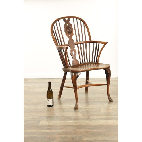 1347 - A 19TH CENTURY ASH AND ELM CABRIOLE LEGGED WINDSOR CHAIR with hooped back and shaped back splat with... 