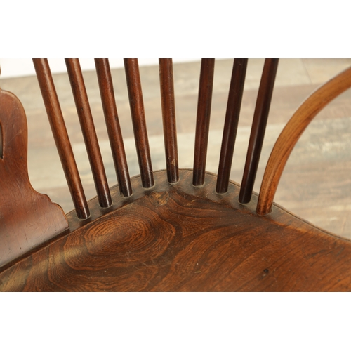 1347 - A 19TH CENTURY ASH AND ELM CABRIOLE LEGGED WINDSOR CHAIR with hooped back and shaped back splat with... 