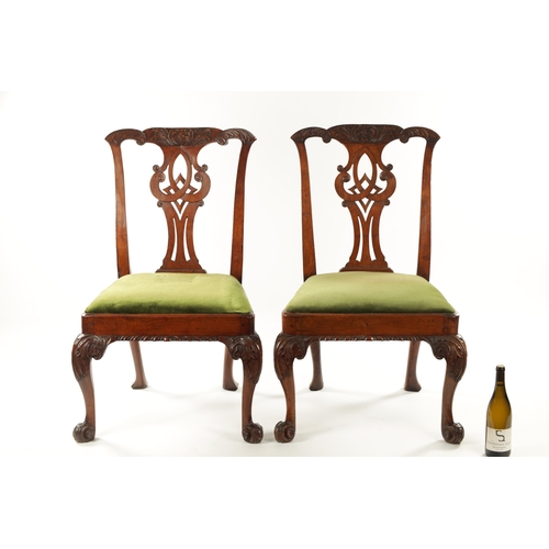 1354 - A GOOD PAIR OF MID 18TH CENTURY WALNUT SIDE CHAIRS the elaborate shaped carved top rails above scrol... 