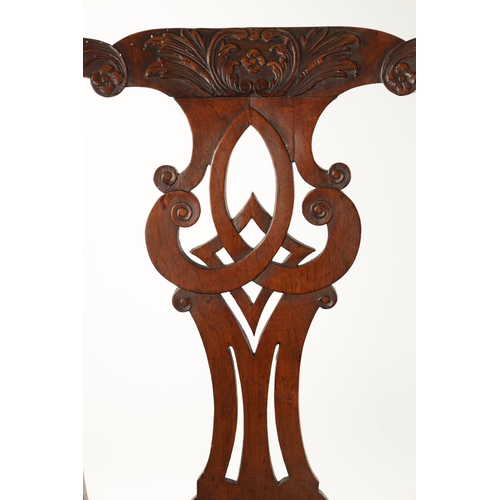 1354 - A GOOD PAIR OF MID 18TH CENTURY WALNUT SIDE CHAIRS the elaborate shaped carved top rails above scrol... 