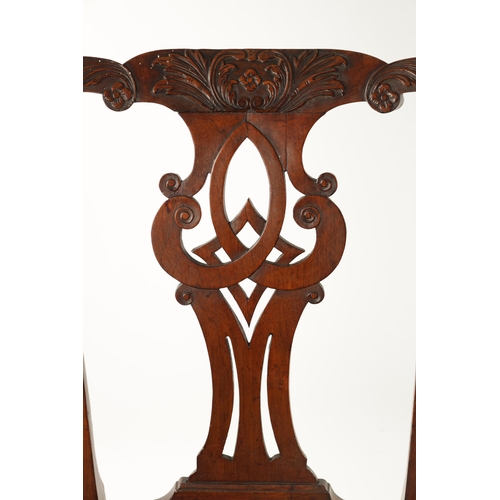 1354 - A GOOD PAIR OF MID 18TH CENTURY WALNUT SIDE CHAIRS the elaborate shaped carved top rails above scrol... 