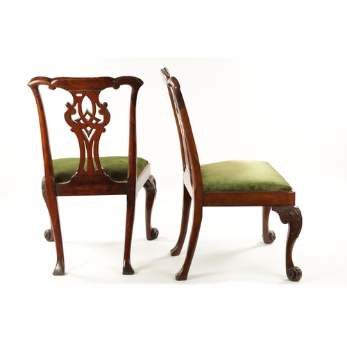 1354 - A GOOD PAIR OF MID 18TH CENTURY WALNUT SIDE CHAIRS the elaborate shaped carved top rails above scrol... 